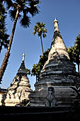 Myanmar - Inwa, stupas nearby the Bagaya Kyaung wooden monastery. 